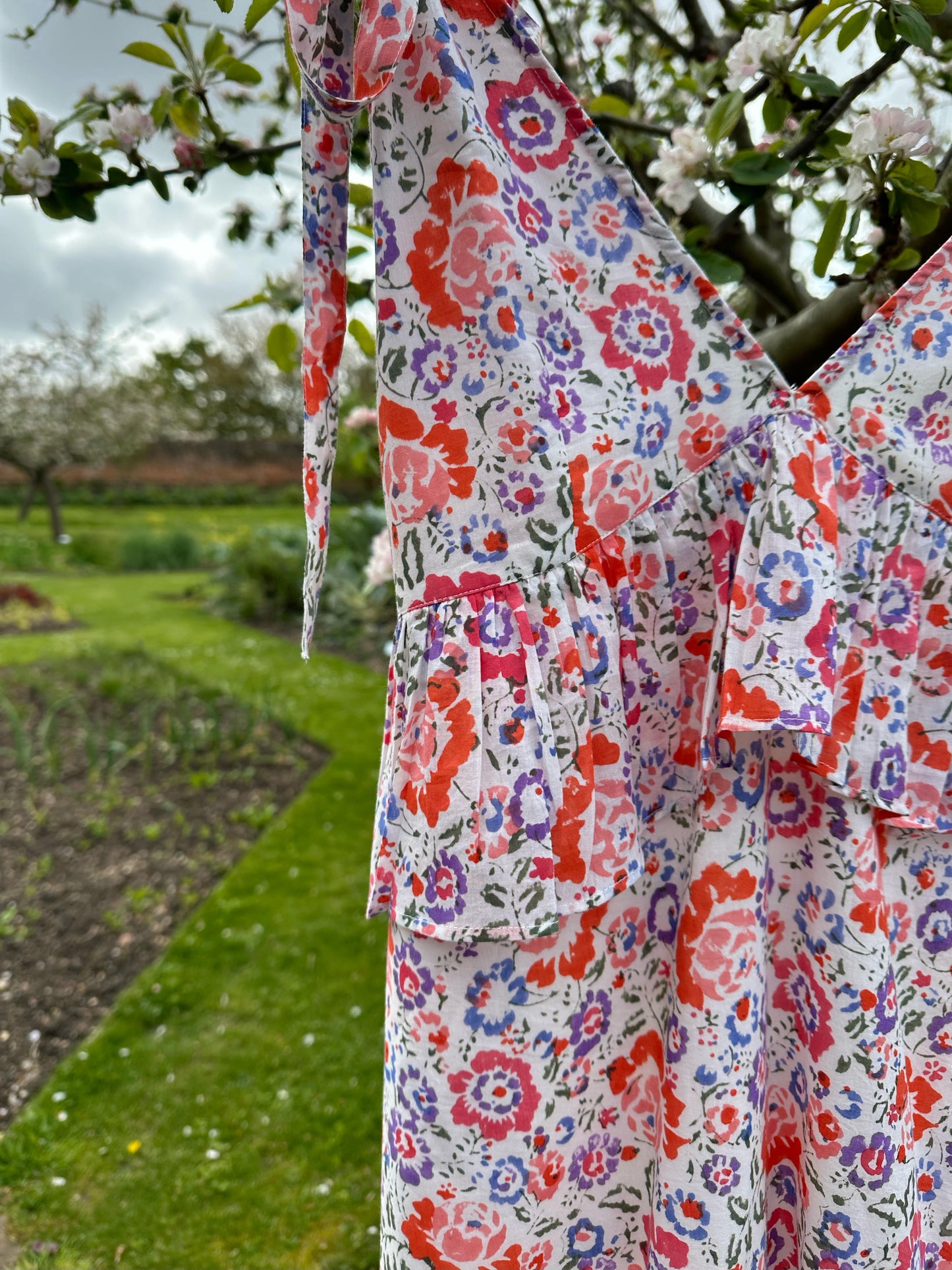 Cara dress by Anetos London. Perfect for wedding guest outfit.