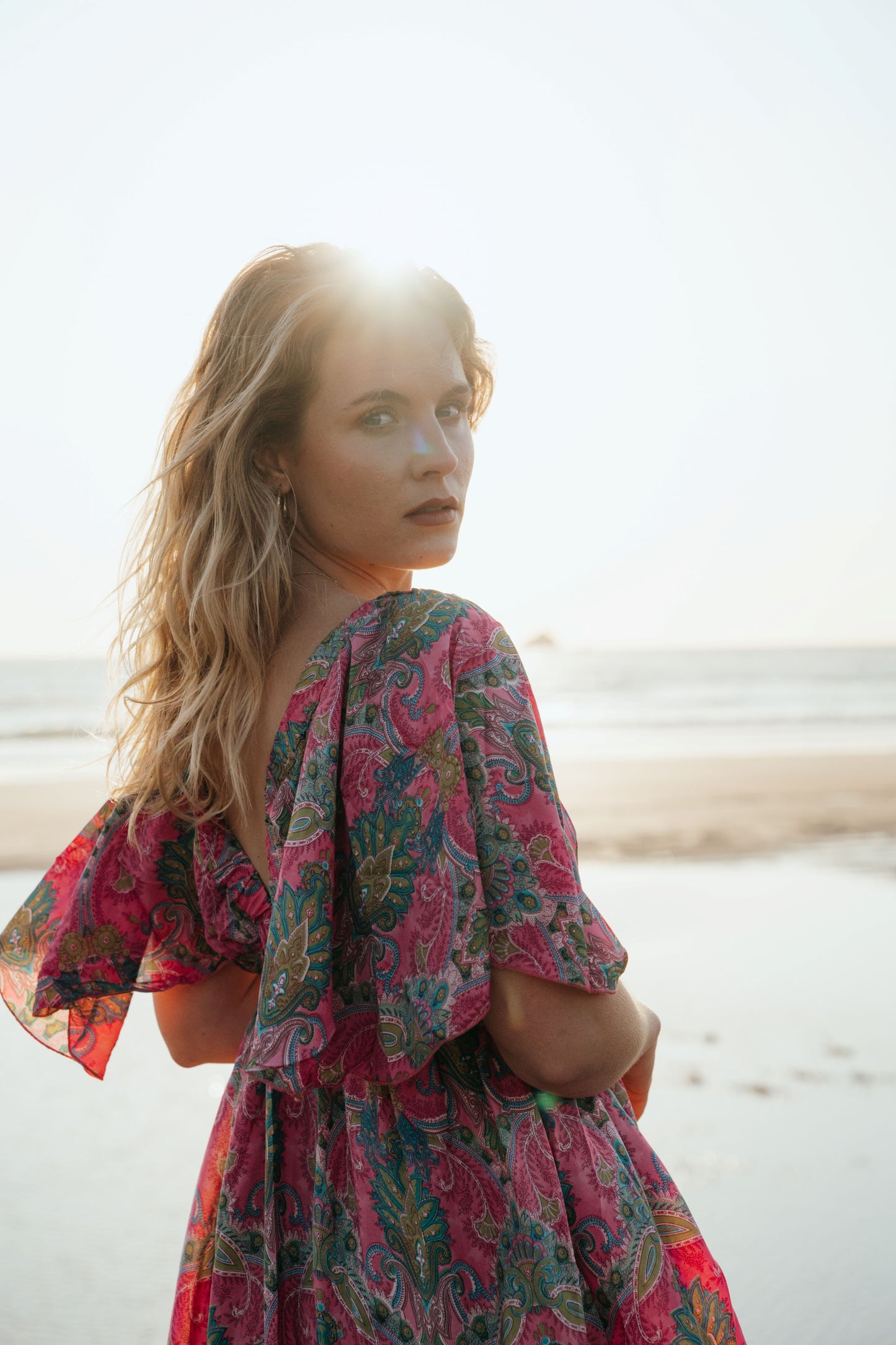 Shop the Gigi dress from Anetos London's collection of effortlessly beautiful designs.